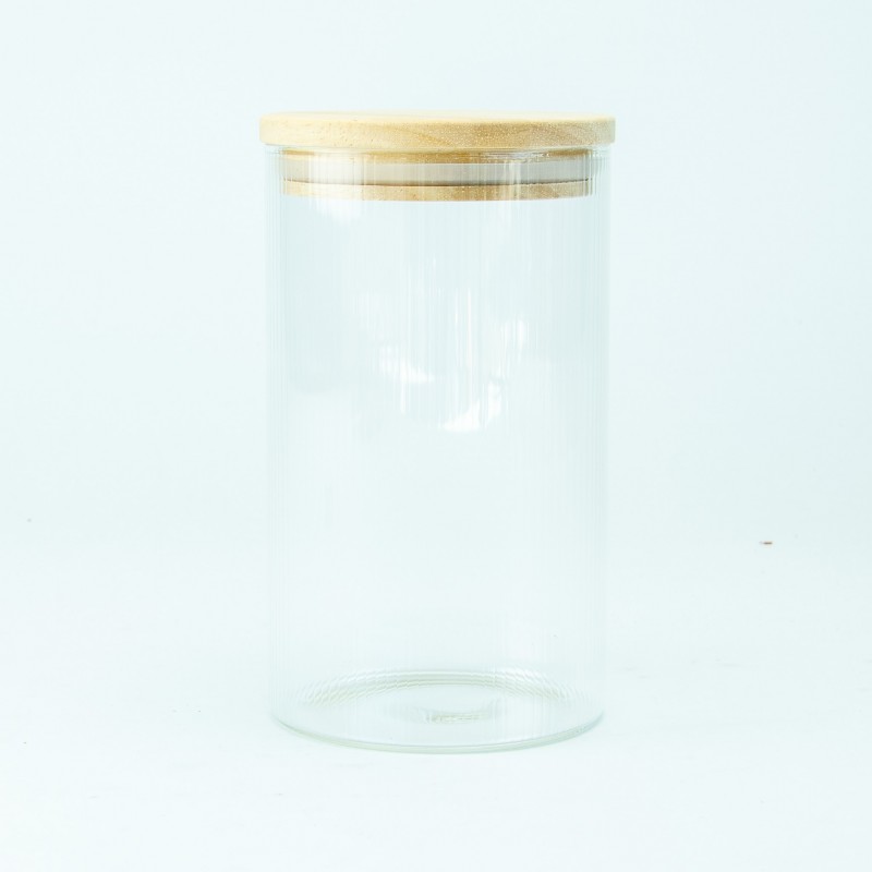 Glazen cylinderpot met geribbelde binnenzijde en houten deksel