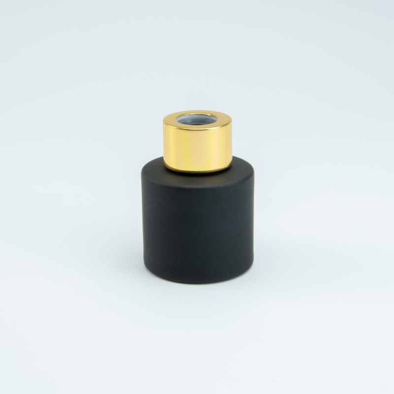 Parfumflesje cylinder zwart met gouden schroefdop - 50 ml