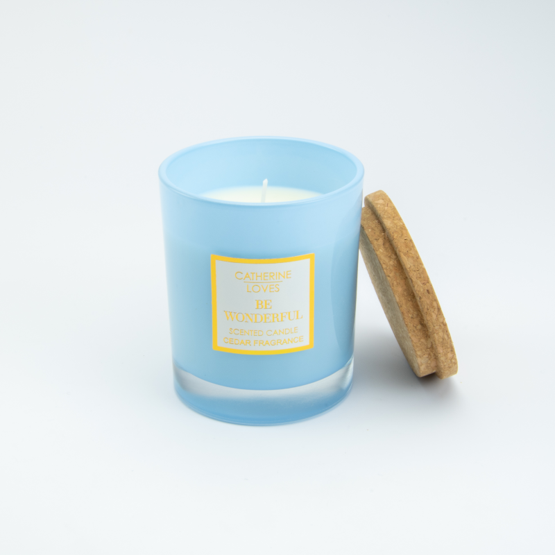 Geurkaars (cederhout) blauw glas met kurkdeksel - 8x8x9,7 cm