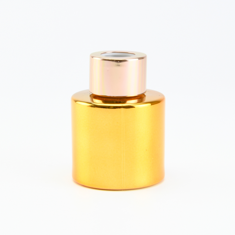 Parfumflesje cylinder goud met "rose gold" schroefdop - 50 ml