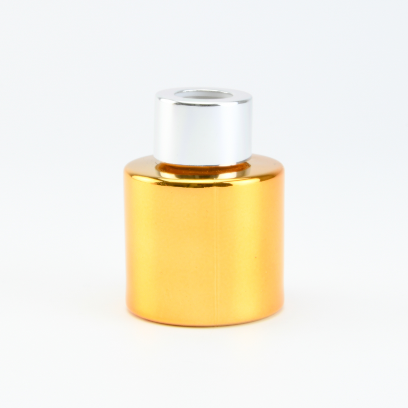 Parfumflesje cylinder goud met zilveren schroefdop - 50 ml