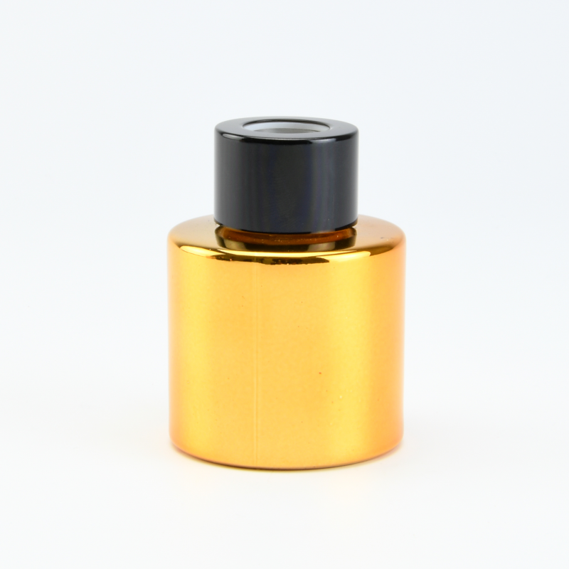 Parfumflesje cylinder goud met zwarte schroefdop - 50 ml