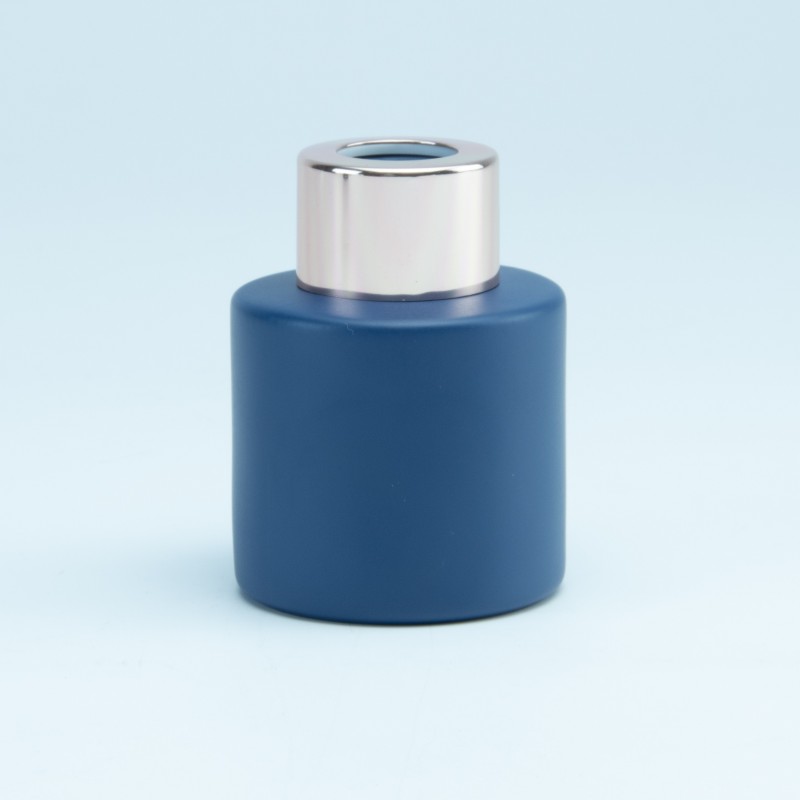 Geurflesje rond marineblauw met rosé schroefdop - 50ml